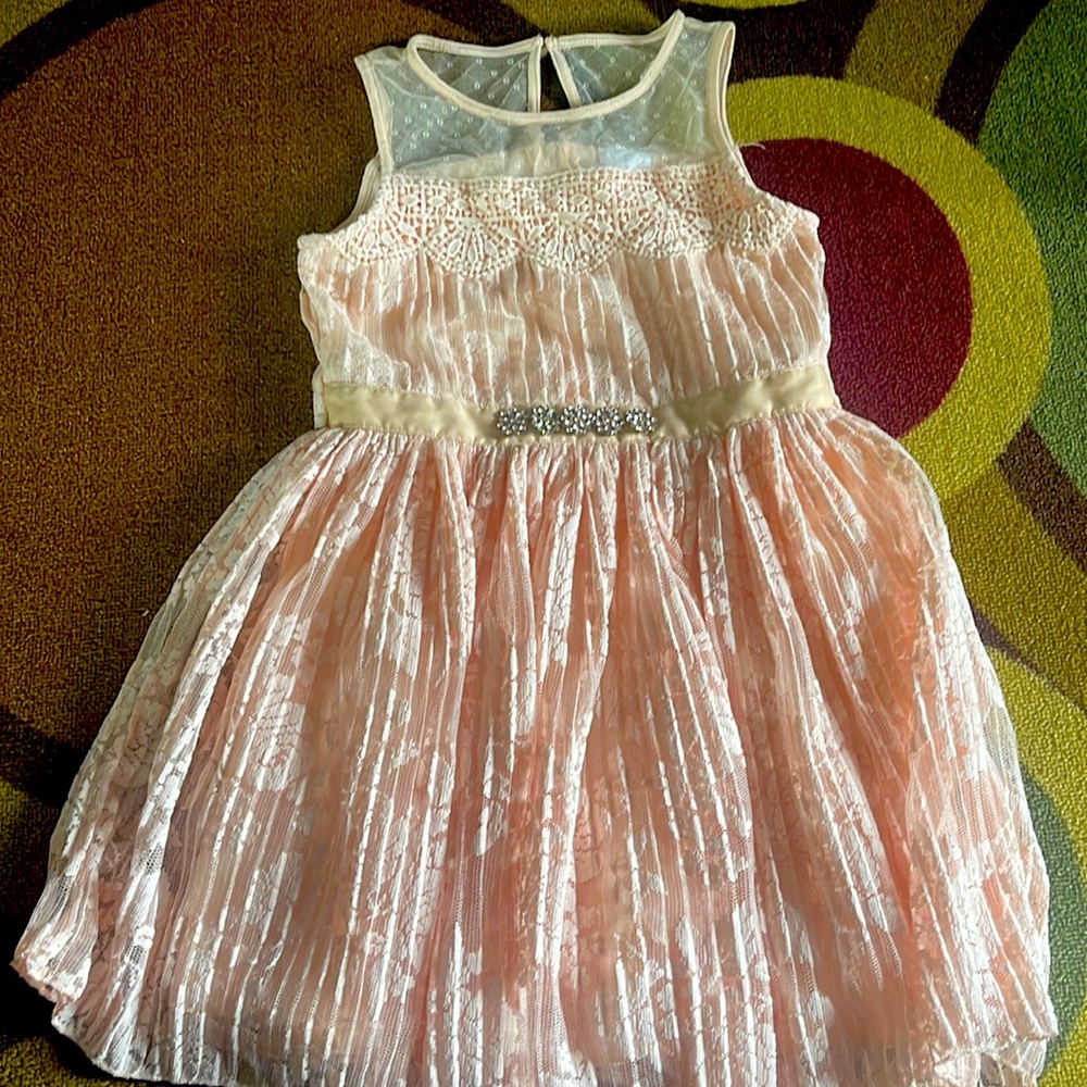 Peach lace little girls formal dress pretty enough for a summer wedding.